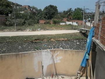 Pavimentação da Rua Agenor Lima  e Canalização limpeza do Rio Brotas.
